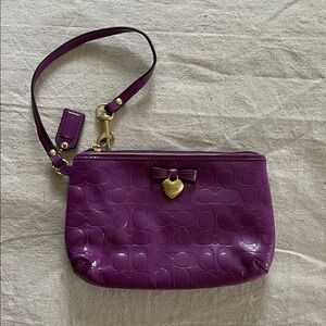Coach Embossed Purple Wristlet